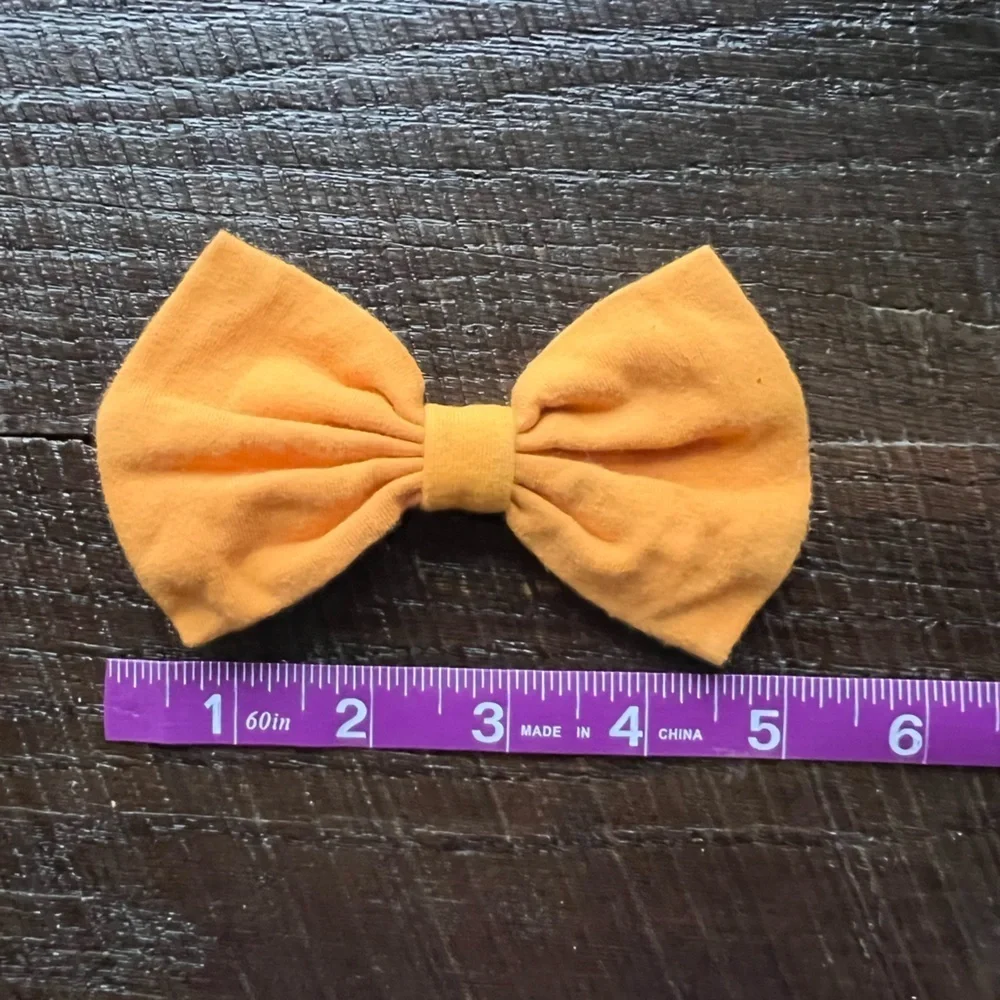 Golden yellow clip bow for girls